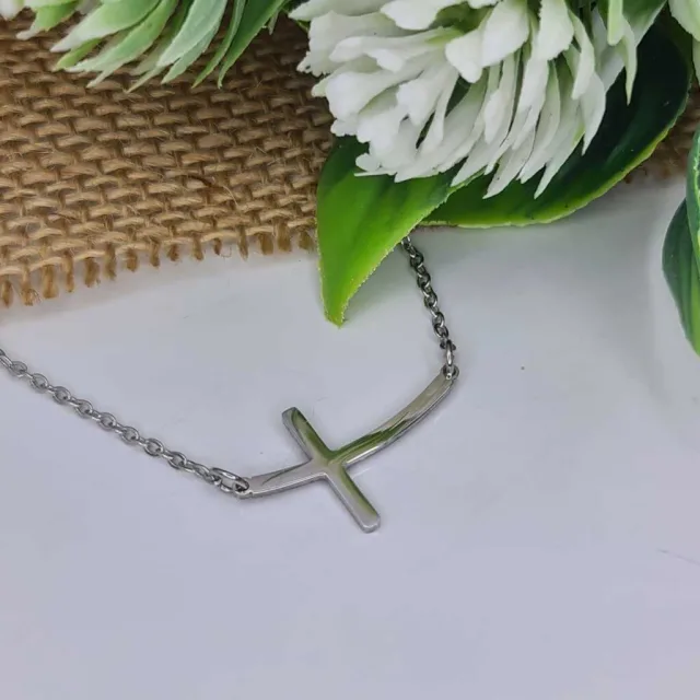 CURVED SIDEWAYS CROSS NECKLACE
